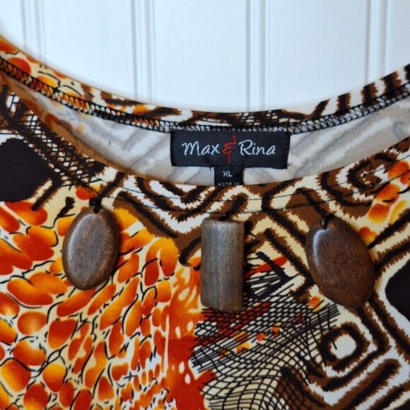 Max & Rina Womens Sz XL Stretch Knit‎ Top Wooden Beads Mixed Print Asymmetrical - Picture 3 of 7